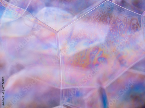 Soap bubbles. Rainbow gradient. Close-up view with soft focus. Macro shot.