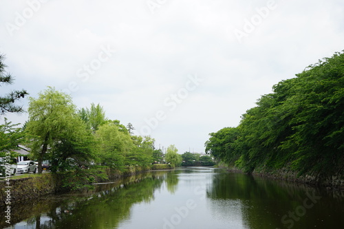 Moat  broad ditch at Hikone castle in Shiga Prefecture  Japan -                                      