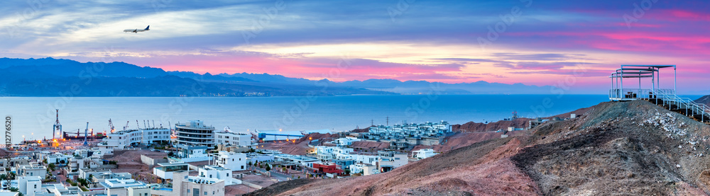 Panoramic image was taken from during twilight from stone hills surrounding Eilat and Aqaba cities, Israel