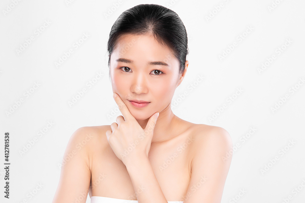 Beautiful young asian woman with clean fresh skin on white background, Face care, Facial treatment, Cosmetology, beauty and spa, Asian women portrait Beautiful young asian woman with clean fresh skin on white background, Face care, Facial treatment, Cosmetology, beauty and spa, Asian women portrait