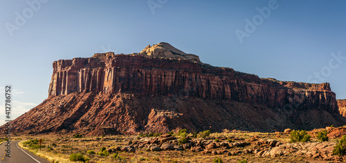 Wide shot of crums massif of orange rock near canyonlands at sunny day in Utah, america