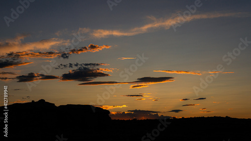 Fototapeta Naklejka Na Ścianę i Meble -  Incoming night on horizon with last red sun rays in canyonland national park in Utah, america