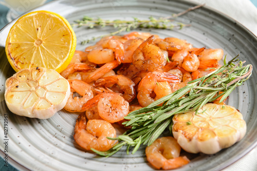 Plate with tasty shrimps, closeup