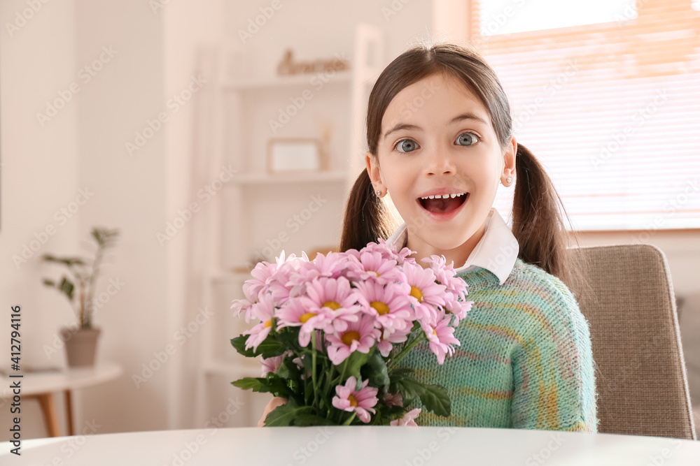 Surprised little girl with bouquet of beautiful flowers at home Surprised little girl with bouquet of beautiful flowers at home