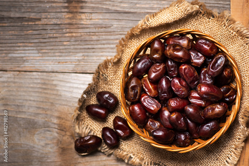 Date fruits in a bowl top view