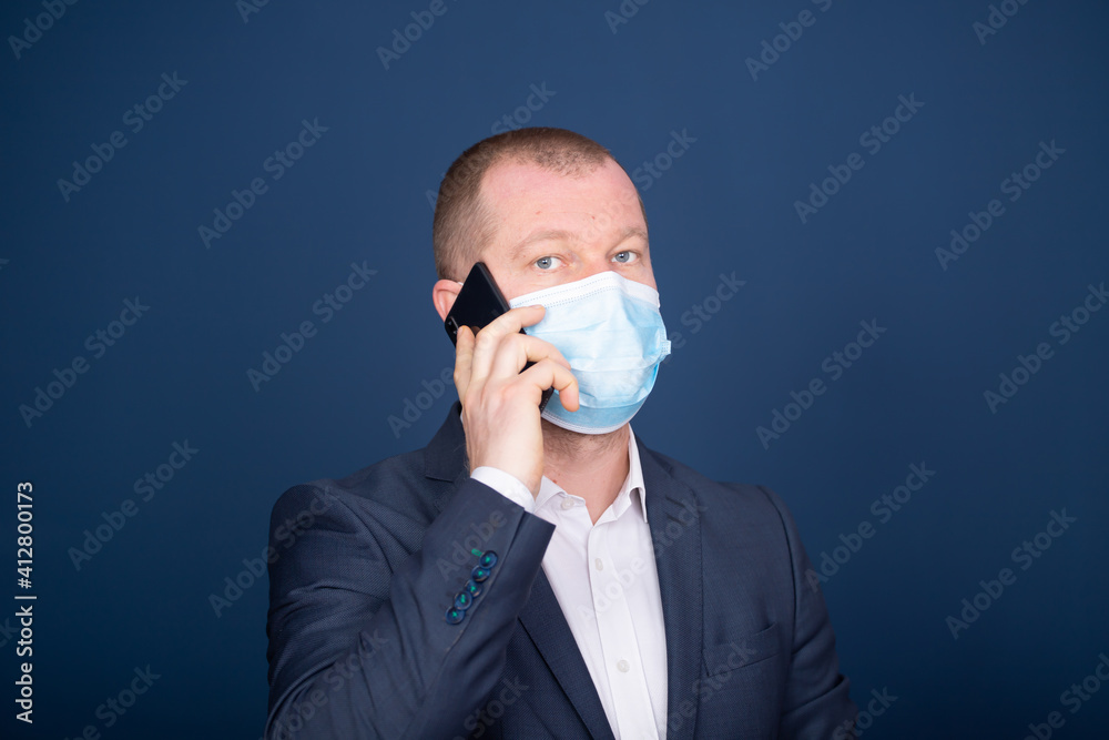 Business man talking on smartphone. Business man talking on smartphone.