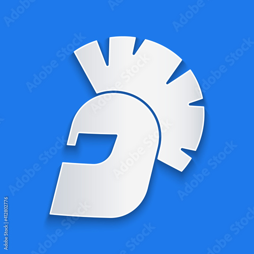 Paper cut Greek helmet icon isolated on blue background. Antiques helmet for head protection soldiers with a crest of feathers or horsehair. Paper art style. Vector.