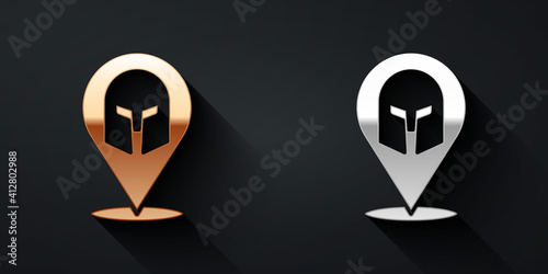 Gold and silver Greek helmet icon isolated on black background. Antiques helmet for head protection soldiers with a crest of feathers or horsehair. Long shadow style. Vector.