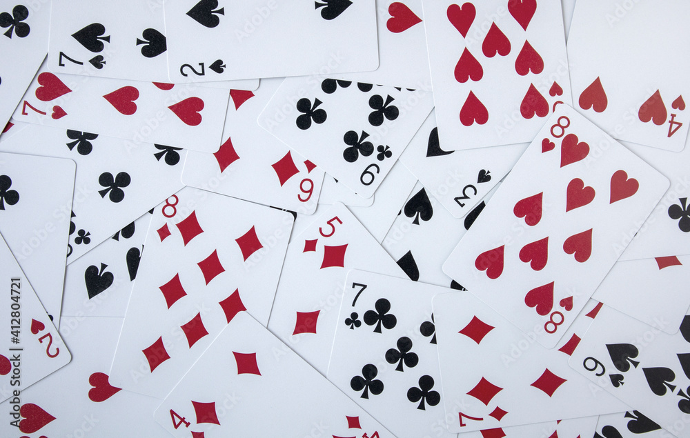 Playing cards number texture background for poker casino game. Playing cards number texture background for poker casino game.