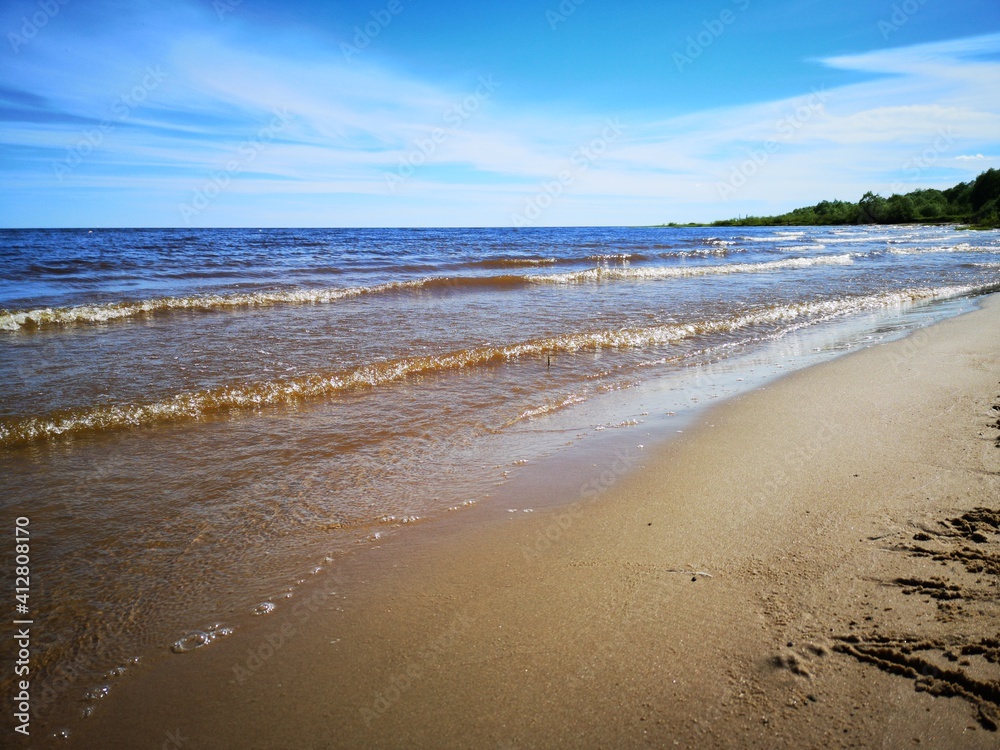the sandy shore of Lake Ilmen waves the wind of the sky