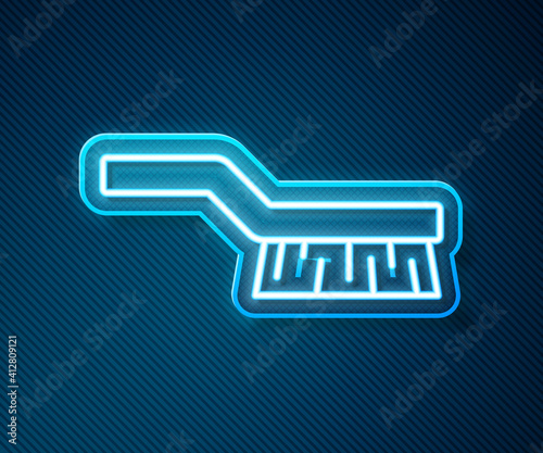Obraz na plátně Glowing neon line Pool table brush icon isolated on blue background