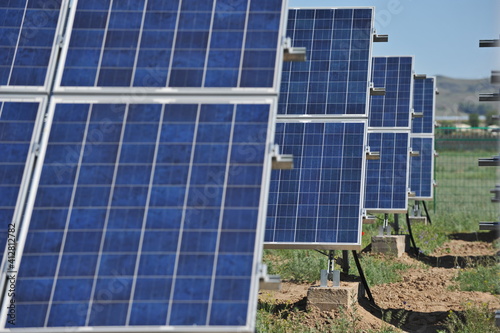 Zhambyl region, Kazakhstan - 05.15.2013 : Solar panels are displayed in a row throughout the station. photo