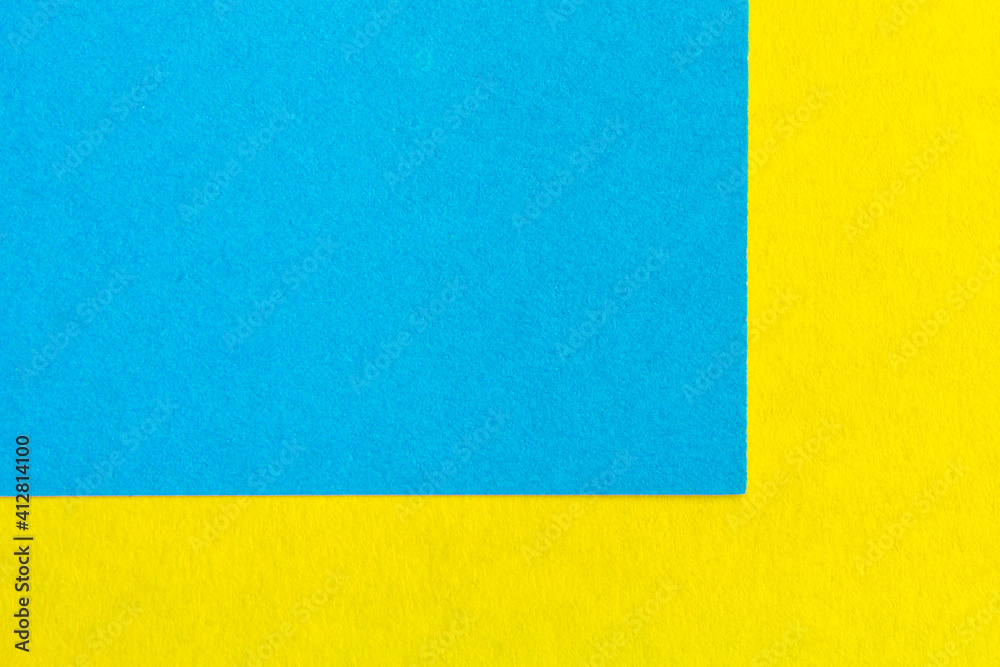 yellow and blue paper texture background Color. Trending colors, geometric background of the paper. Colorful soft paper background.Pastel color.