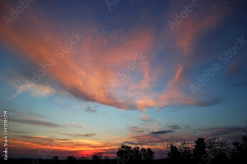 Beautiful sunset with clouds. Travel concept. Copy space for text.