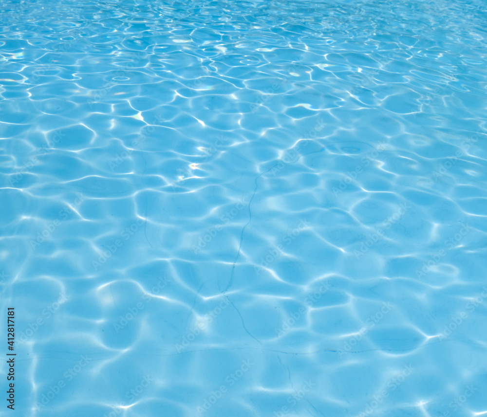 View of a swimming pool with reflections background.