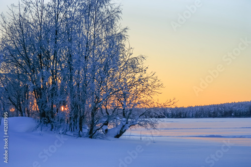 There is a sunset on a frosty winter day. February, 09. 2021.