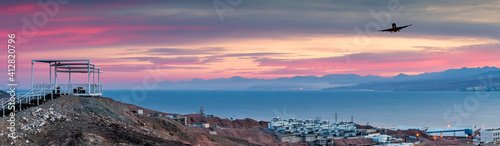 Scenic point of view on the Red Sea and mountains with decorative pergola and...