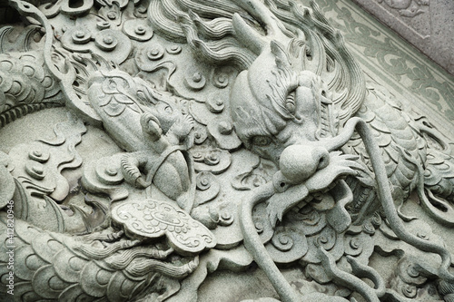 Chinese style dragon statue and cloud. 
