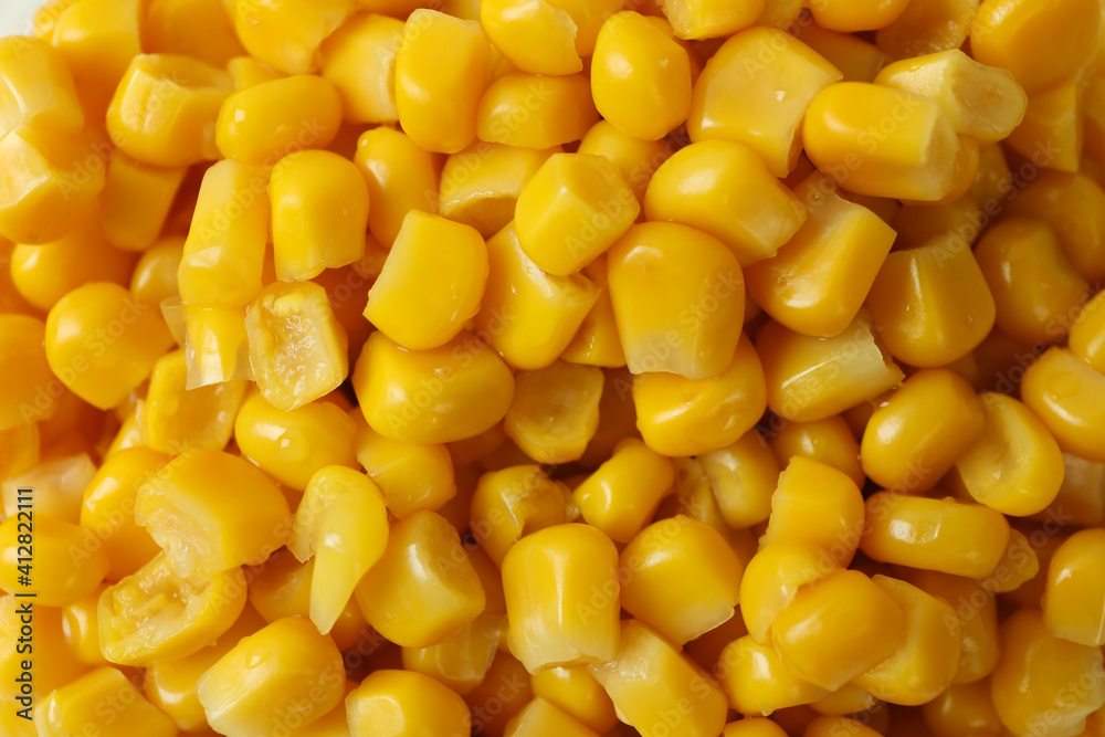 Tasty canned corn on whole background, close up Tasty canned corn on whole background, close up