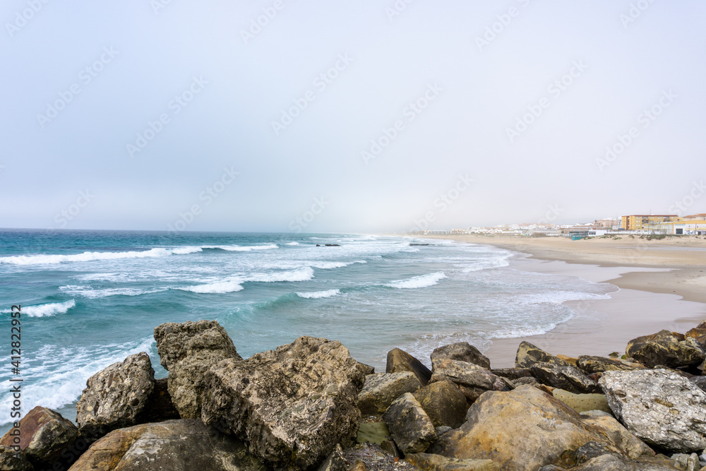 view of the Los Lances Beach in downtown Tarifa on the Strait of Gibraltar view of the Los Lances Beach in downtown Tarifa on the Strait of Gibraltar