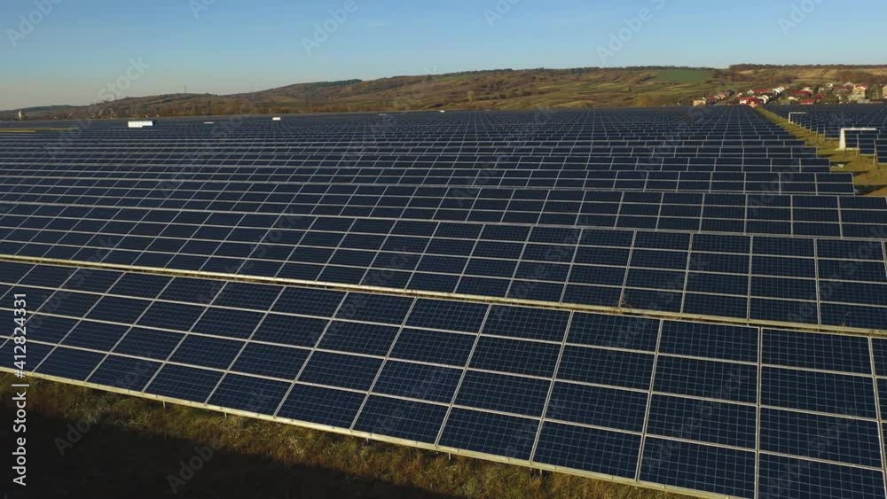 Drone shooting solar panel station. Flying at low altitude. 4K. Drone shooting solar panel station. Flying at low altitude. 4K.