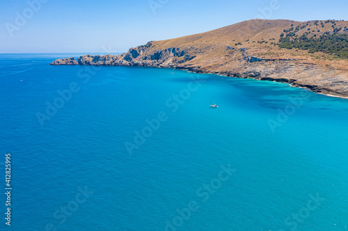 An aerial view on Cala Mesquida shoreline on Mediterranean Mallorca island in Spain