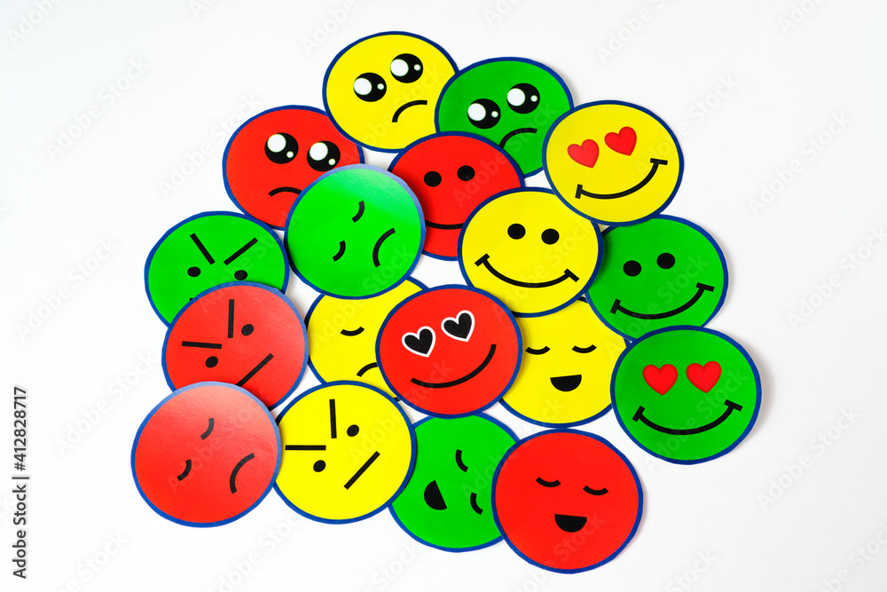 All emotions with emoticons mixed on a white background, we have the