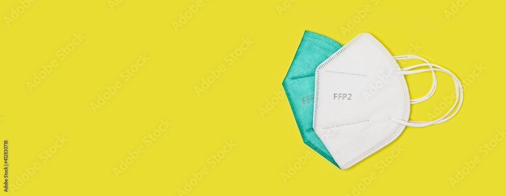 Different anti virus protection masks ffp2 standart to prevent corona COVID-19 infection. Panoramic image with copy space. Different anti virus protection masks ffp2 standart to prevent corona COVID-19 infection. Panoramic image with copy space.