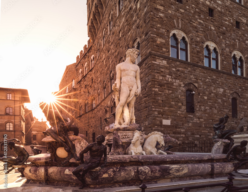 Fountain Neptune. Sunrise sun, empty square (Piazza della Signoria) Florence, Italy