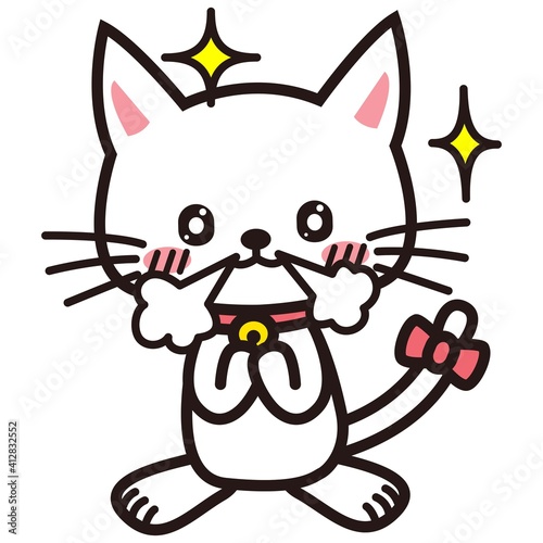 興奮する白い猫