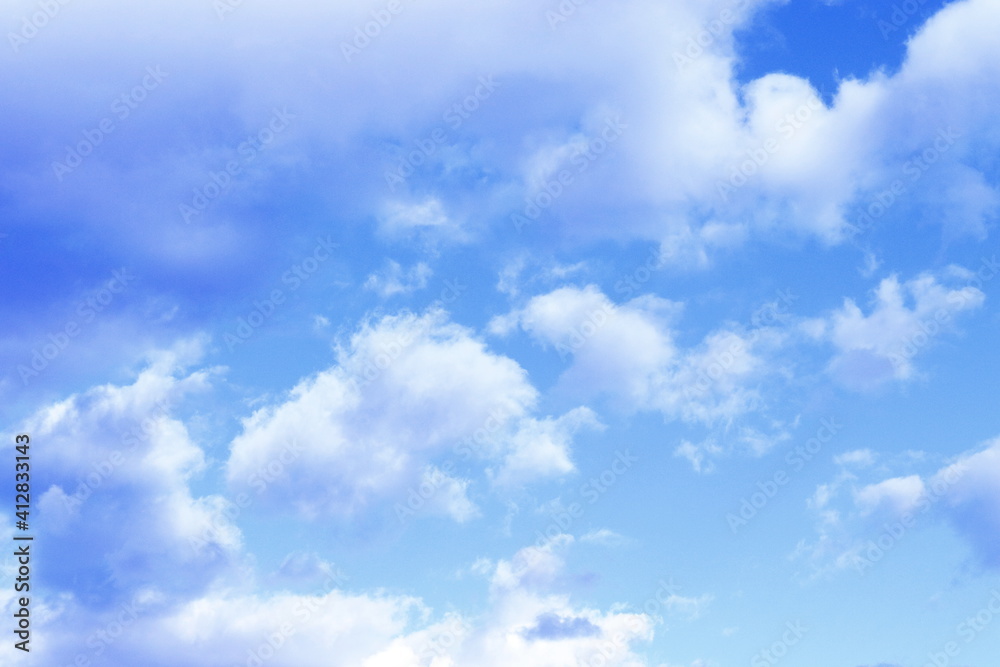 Obraz premium blue sky and clouds in white and gray tones.