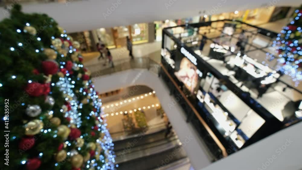 Blurred and unrecognizable people are walking in the shopping mall. Blurred and unrecognizable people are walking in the shopping mall.