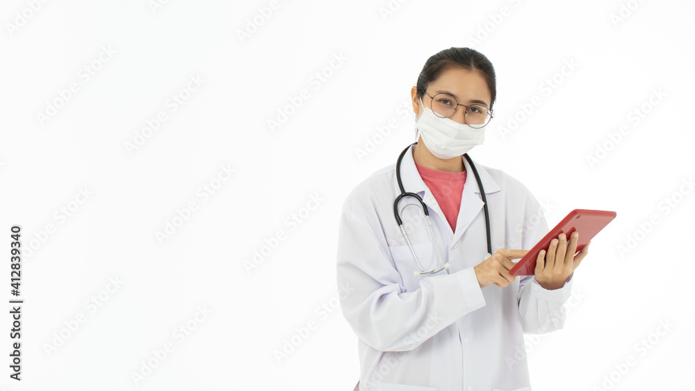 Portrait of Asian female doctor in white gown coat wearing protective hygiene mask and holding a tablet computer in hand. Isolated on white background