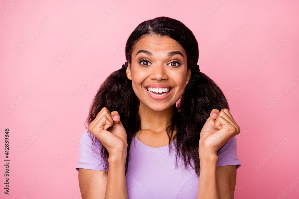 Close-up portrait of attractive cheerful girl expecting great news isolated over pink pastel color background Close-up portrait of attractive cheerful girl expecting great news isolated over pink pastel color background