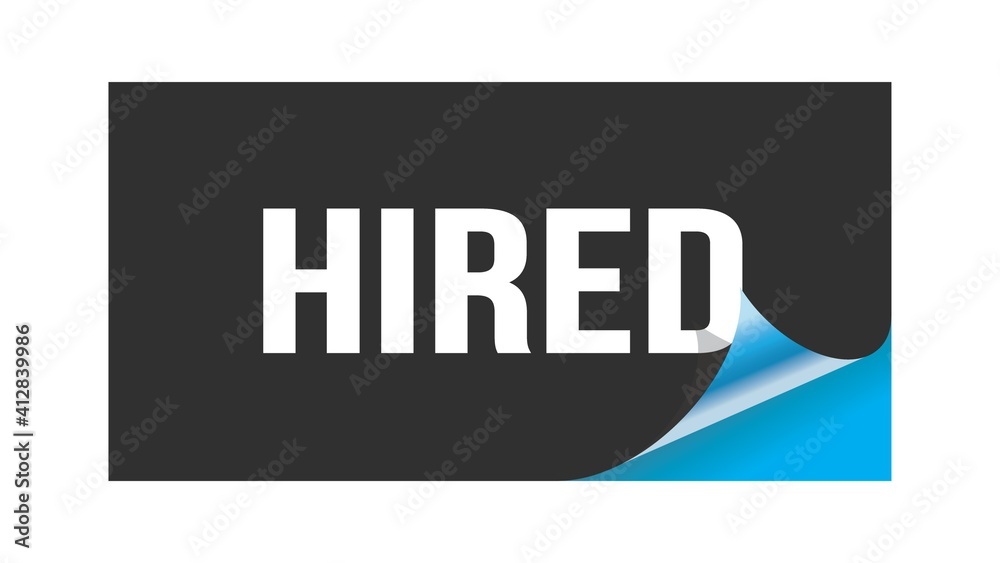 HIRED text written on black blue sticker. HIRED text written on black blue sticker.