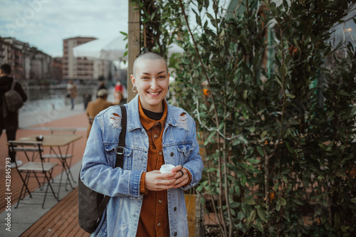 Alternative girl is drinking coffee