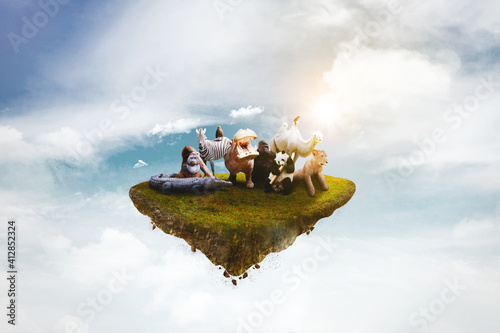 Photography Floating island on the blue sky with wild animals