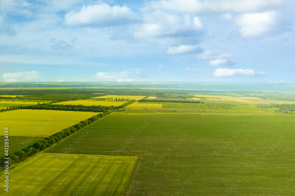 Beautiful aerial view of fields and blue sky