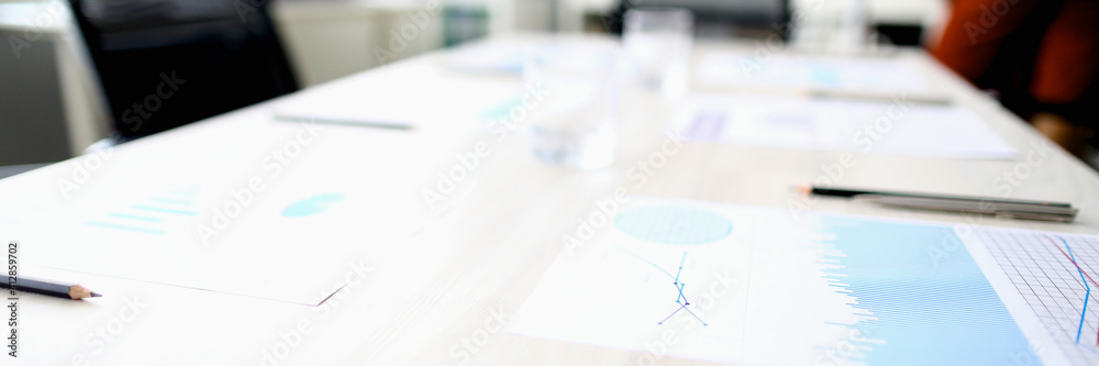 Desk in office with meeting documents. Venue for business events concept - obrazy, fototapety, plakaty 