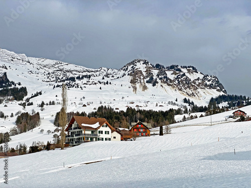 View of the tourist resort and subalpine settlement Amden on the slopes of the Mattstogg mountain range - Canton of St. Gallen, Switzerland (Schweiz) photo