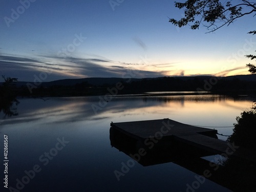 Fotobehang Scenic View Of Lake Against Sky During Sunset