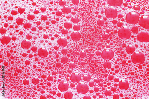red background with foam and bubbles