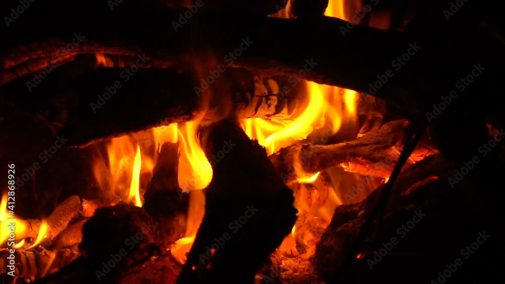 burning wood fire in fireplace
burning wood fire in fireplace