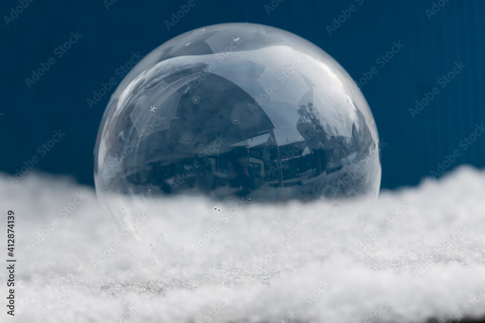 Frozen Soap Bubble on a cold winter morining Frozen Soap Bubble on a cold winter morining
