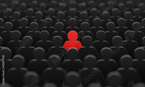 Fotografia Red man color figurine among crowd black men people background