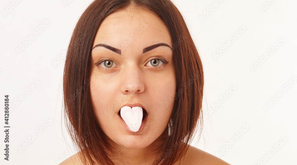 Fashion portrait pretty sweet young woman having fun with lollipop Fashion portrait pretty sweet young woman having fun with lollipop