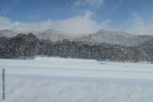 Snow Covered Field Against Sky © 直 西口/EyeEm