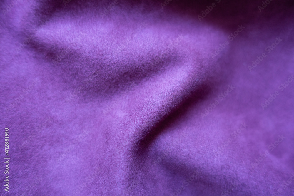 Rumpled violet faux suede fabric from above Rumpled violet faux suede fabric from above