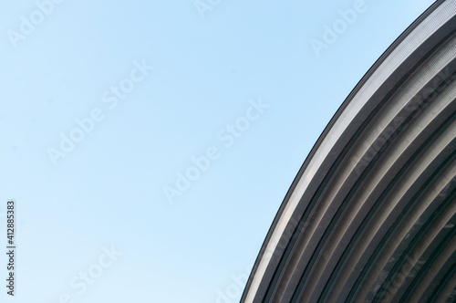 Beautiful curved roof against the sky background