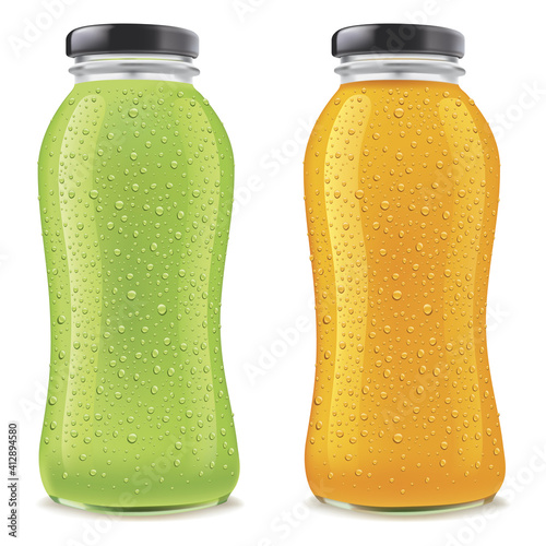 Juice Bottles with many fresh ice drops isolated on white	- green and orange